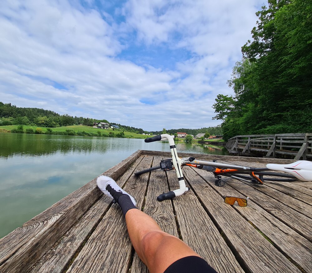 Cyclist enjoying lake view